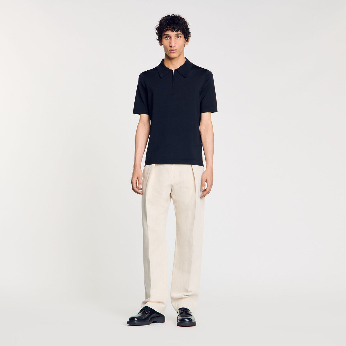 Sandro Knitted polo shirt with zip collar Fonte